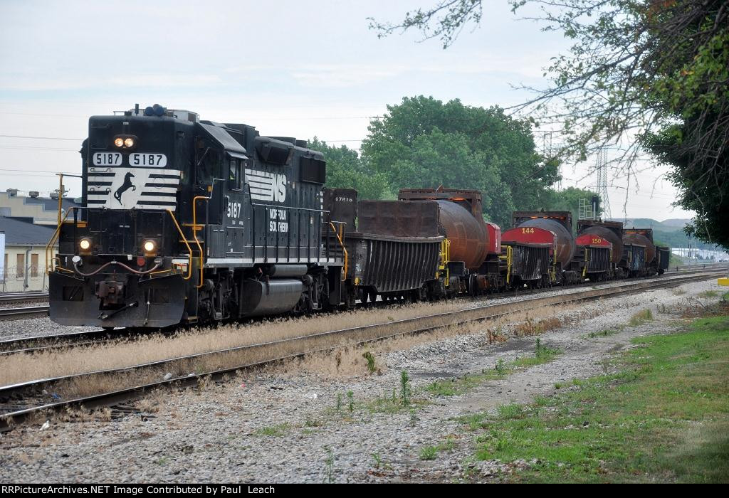 Hot bottle train eases west on the Harbor